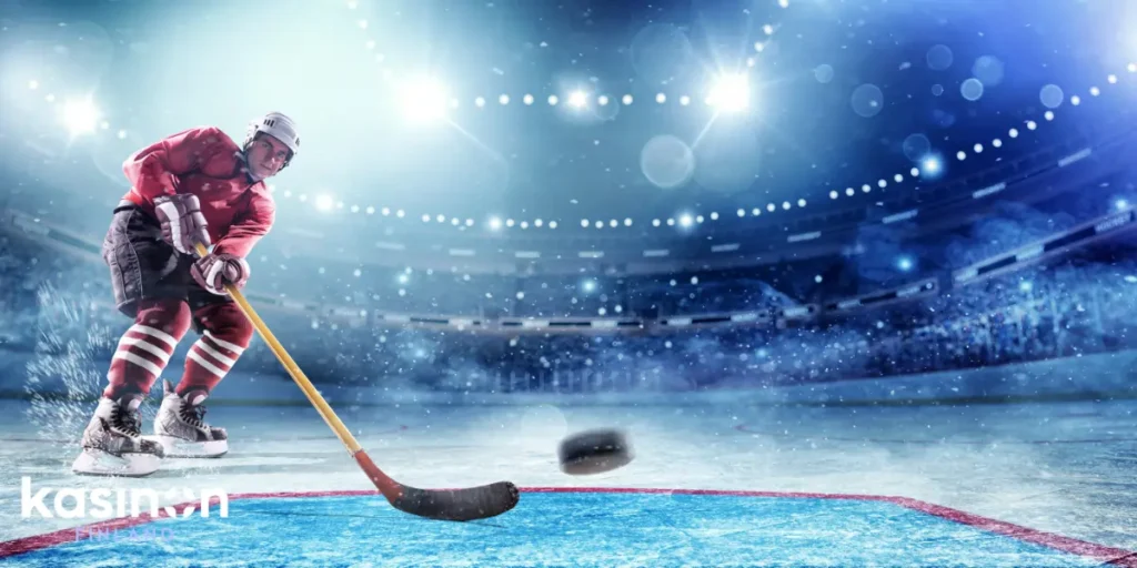 NHL vedonlyönti aiheinen kuva, jossa Edmonton Oilersin pelaaja laukaisemassa kohti maalia.